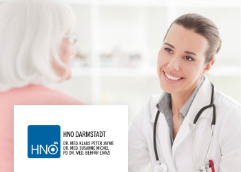 Ärtztin mit Patienten im Ges.Gräch